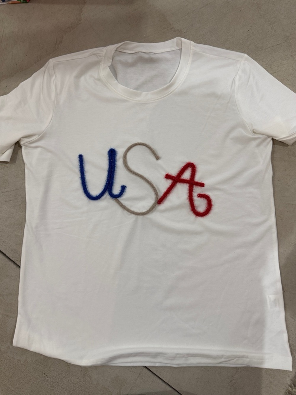 White Tee with USA Script Design